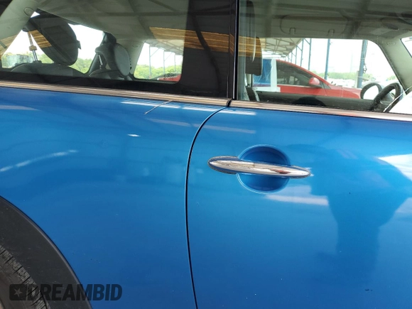 2011 MINI Hardtop with VIN WMWSU3C52BT252207, listed as a Copart auction lot 62735905 with 121,121 mi miles and Salvage title. Bid and sale history available at DreamBid. Image 10.