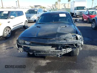 2012 Dodge Challenger SXT Plus z VIN 2C3CDYAG6CH125164, wystawiony jako IAAI lot #41754809 z przebiegiem 95 882 mil mil oraz . Historia ofert i sprzedaży dostępna na DreamBid. Obrazek 6.