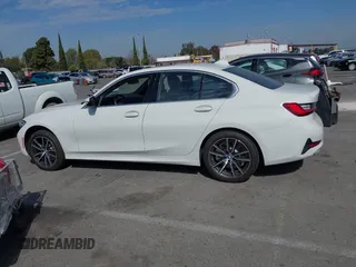 2019 BMW 3 Series 330i with VIN WBA5R1C55KAK12332, listed as a IAAI auction lot 41692035 with 13,657 mi miles and . Bid and sale history available at DreamBid. Image 14.