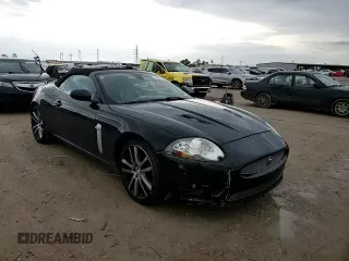 2007 Jaguar XK XKR with VIN SAJWA44C879B19251, listed as a Copart auction lot 50807595 with 100,715 mi miles and Salvage Title. Bid and sale history available at DreamBid. Image 11.