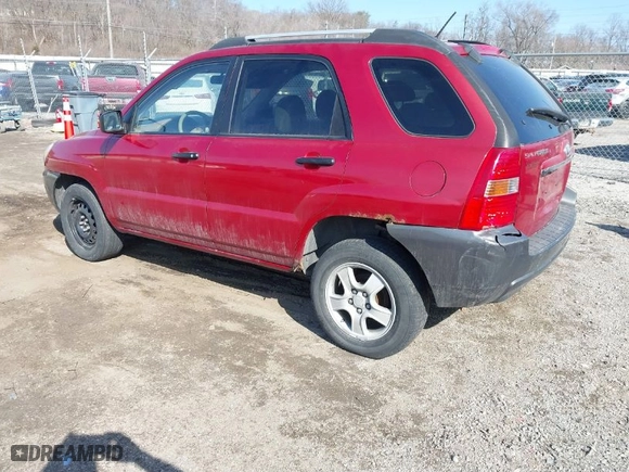 2007 Kia Sportage LX with VIN KNDJF724477445886, listed as a IAAI auction lot 41778532 with 253,979 mi miles. Bid and sale history available at carsss.com. Image 3.
