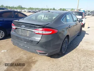 2017 Ford Fusion Titanium with VIN 3FA6P0K9XHR118057, listed as a IAAI auction lot 41982261 with 151,704 mi miles. Bid and sale history available at carsss.com. Image 4.