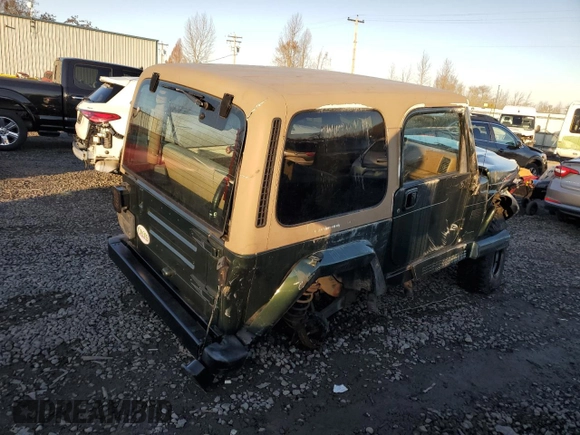 1998 Jeep Wrangler Sahara z VIN 1J4FY49S5WP798505, wystawiony jako Copart lot #88394465 z przebiegiem Nie podano mil oraz Szkoda całkowita • Salvage title. Historia ofert i sprzedaży dostępna na DreamBid. Obrazek 3.