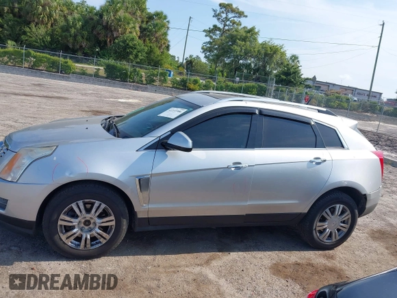 2014 Cadillac SRX Luxury Collection z VIN 3GYFNEE36ES652353, wystawiony jako IAAI lot #42233986 z przebiegiem 146 029 mil mil oraz . Historia ofert i sprzedaży dostępna na DreamBid. Obrazek 14.
