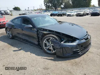 2023 Audi e-tron GT Prestige z VIN WAUDJBFWXP7003055, wystawiony jako Copart lot #71028874 z przebiegiem 7107 mil mil oraz Szkody całkowita. Historia ofert i sprzedaży dostępna na DreamBid. Obrazek 4.