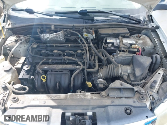 2011 Ford Focus S with VIN 1FAHP3EN7BW113051, listed as a IAAI auction lot 42002223 with 220,895 mi miles. Bid and sale history available at carsss.com. Image 10.