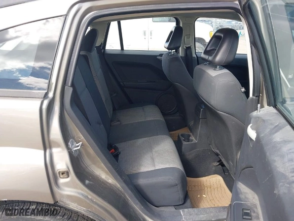 2008 Dodge Caliber SXT with VIN 1B3HB48B48D578845, listed as a IAAI auction lot 41841247 with 330,373 mi miles. Bid and sale history available at carsss.com. Image 8.