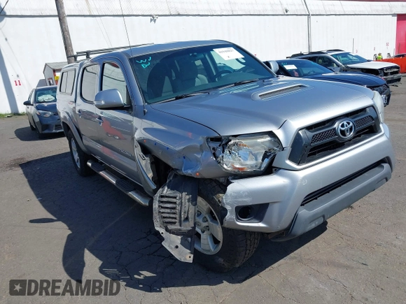 2014 Toyota Tacoma with VIN 3TMLU4EN7EM146705, listed as a IAAI auction lot 41949827 with 147,887 mi miles and . Bid and sale history available at DreamBid. Image 1.