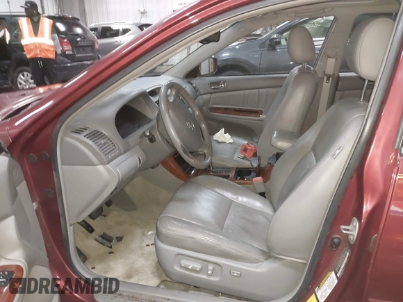 2005 Toyota Camry LE with VIN 4T1BF30KX5U099450, listed as a IAAI auction lot 41670099 with Not Provided miles and . Bid and sale history available at DreamBid. Image 5.