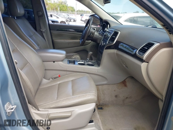2013 Jeep Grand Cherokee Laredo with VIN 1C4RJEAG2DC517303, listed as a IAAI auction lot 42040405 with 222,952 mi miles. Bid and sale history available at carsss.com. Image 5.