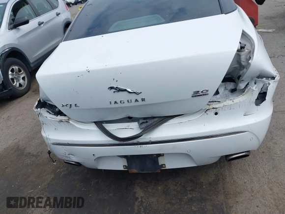 2013 Jaguar XJ Portfolio with VIN SAJWJ2GD3D8V48238, listed as a IAAI auction lot 40435160 with 136,738 mi miles and . Bid and sale history available at DreamBid. Image 6.