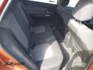 2007 Kia Spectra with VIN KNAFE161275003137, listed as a IAAI auction lot 41697530 with 256,834 mi miles. Bid and sale history available at carsss.com. Image 8.