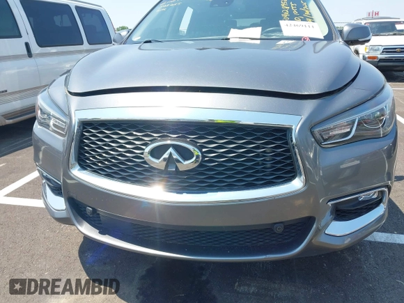 2019 Infiniti QX60 Pure with VIN 5N1DL0MN7KC563655, listed as a IAAI auction lot 42469111 with 84,864 mi miles and . Bid and sale history available at DreamBid. Image 6.