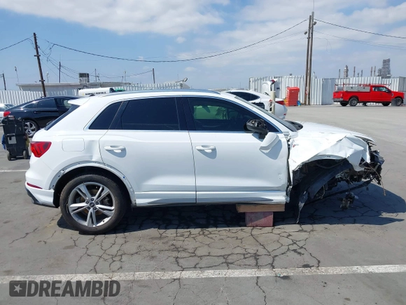 2021 Audi Q3 S line Premium with VIN WA1DECF37M1055948, listed as a IAAI auction lot 42141007 with 48,763 mi miles and . Bid and sale history available at DreamBid. Image 14.