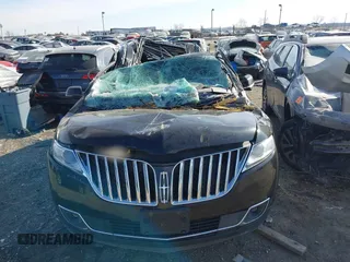 2015 Lincoln MKX with VIN 2LMDJ8JK7FBL23191, listed as a IAAI auction lot 41653687 with 115,798 mi miles. Bid and sale history available at carsss.com. Image 6.