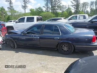 2000 Ford Crown Victoria LX с VIN 2FAFP74W4YX116561, выставлен на аукционе IAAI как лот 42101875 с пробегом Не указан миль и . История ставок и продаж доступна на DreamBid. Изображение 14.