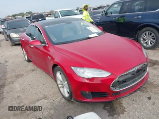 2013 Tesla Model S with VIN 5YJSA1CN9DFP09973, listed as a IAAI auction lot 41657188 with 61,546 mi miles. Bid and sale history available at carsss.com. Image 1.