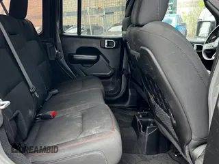 2022 Jeep Wrangler Unlimited Rubicon z VIN 1C4HJXFNXNW745921, wystawiony jako Copart lot #60096775 z przebiegiem 100 mil mil oraz Czysty tytuł • Clean title. Historia ofert i sprzedaży dostępna na DreamBid. Obrazek 6.