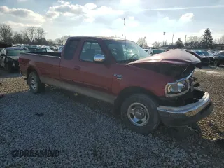 2002 Ford F-150 XL with VIN 1FTRX17W72NB29281, listed as a Copart auction lot 44590305 with 319,663 mi miles and Salvage Title. Bid and sale history available at carsss.com. Image 4.