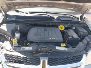 2013 Dodge Grand Caravan Crew with VIN 2C4RDGDG1DR800538, listed as a IAAI auction lot 42211140 with 138,647 mi miles and . Bid and sale history available at DreamBid. Image 10.