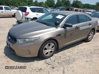 2014 Ford Police Interceptor with VIN 1FAHP2MK4EG131670, listed as a IAAI auction lot 42614498 with 110,254 mi miles and . Bid and sale history available at DreamBid. Image 2.