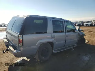 1999 GMC Denali z VIN 1GKEK13R4XR909773, wystawiony jako Copart lot #80350594 z przebiegiem 177 807 mil mil oraz Szkody całkowita. Historia ofert i sprzedaży dostępna na DreamBid. Obrazek 3.