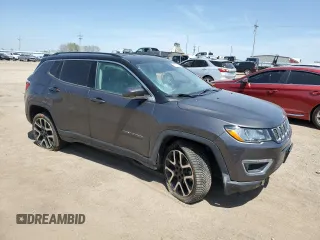 2018 Jeep Compass Limited with VIN 3C4NJDCB9JT261879, listed as a Copart auction lot 56523365 with 172,382 mi miles and Salvage title. Bid and sale history available at DreamBid. Image 4.