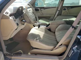1998 Mercedes-Benz E-Class with VIN WDBJH65F2WA689599, listed as a Copart auction lot 76712344 with 0 mi miles and Salvage Title. Bid and sale history available at carsss.com. Image 7.