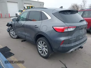 2021 Ford Escape Titanium with VIN 1FMCU9J92MUA27097, listed as a IAAI auction lot 41542774 with 14,822 mi miles and . Bid and sale history available at carsss.com. Image 3.