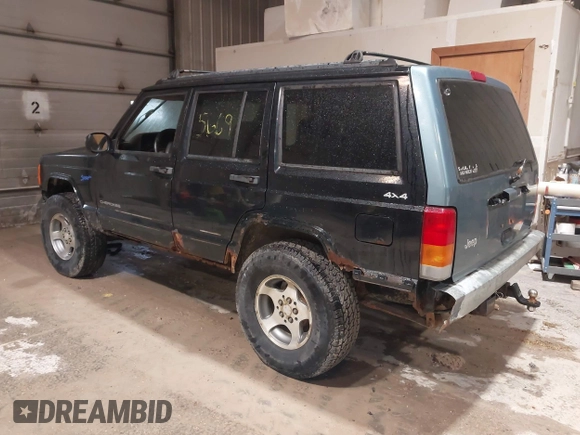 1998 Jeep Cherokee Sport z VIN 1J4FJ68S2WL142027, wystawiony jako IAAI lot #42305669 z przebiegiem 249 580 mil mil oraz . Historia ofert i sprzedaży dostępna na DreamBid. Obrazek 3.