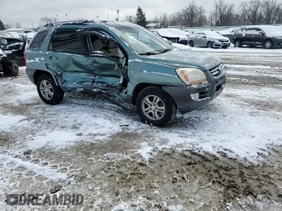 2005 Kia Sportage LX with VIN KNDJF723X57125430, listed as a Copart auction lot 86552714 with Not Provided miles and Salvage Title. Bid and sale history available at carsss.com. Image 11.