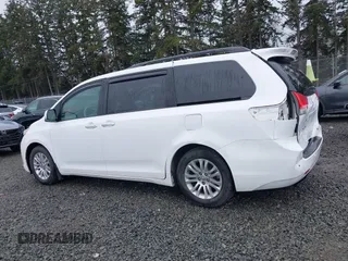 2014 Toyota Sienna XLE with VIN 5TDYK3DC2ES485846, listed as a IAAI auction lot 41693092 with 106,156 mi miles and . Bid and sale history available at DreamBid. Image 15.