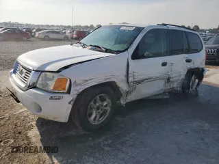2004 GMC Envoy SLE с VIN 1GKDT13SX42111505, выставлен на аукционе Copart как лот 61845845 с пробегом 197 835 миль миль и Списание • Salvage title. История ставок и продаж доступна на DreamBid. Изображение 1.