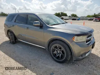 2013 Dodge Durango SXT with VIN 1C4RDHAGXDC592730, listed as a Copart auction lot 60841945 with 130,239 mi miles and Salvage title. Bid and sale history available at DreamBid. Image 4.