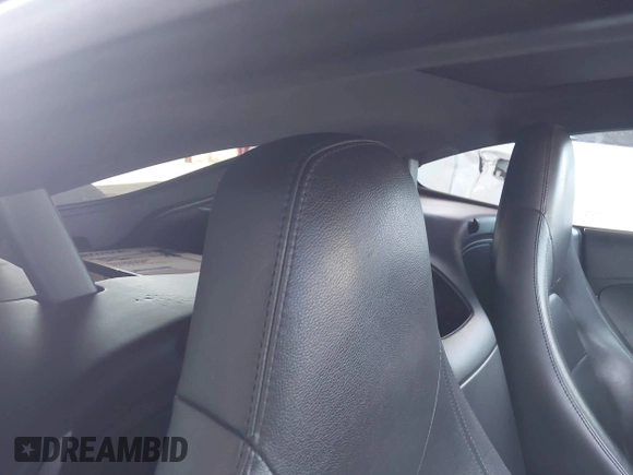 2017 Jaguar F-Type Premium with VIN SAJWA6AT4H8K44039, listed as a IAAI auction lot 41903821 with 76,393 mi miles and . Bid and sale history available at DreamBid. Image 8.
