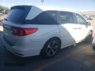 2020 Honda Odyssey Touring with VIN 5FNRL6H8XLB007622, listed as a Copart auction lot 76297494 with 83,452 mi miles and Salvage Title. Bid and sale history available at DreamBid. Image 3.