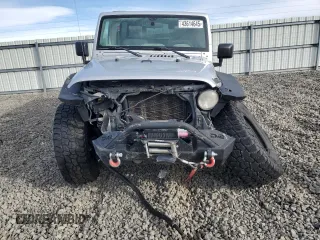 2009 Jeep Wrangler Unlimited Rubicon with VIN 1J8GA69139L703848, listed as a Copart auction lot 43614645 with 172,801 mi miles and Salvage title. Bid and sale history available at DreamBid. Image 5.