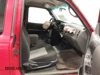 2005 Ford Ranger XLT z VIN 1FTZR45E15PA52471, wystawiony jako IAAI lot #41478665 z przebiegiem Nie podano mil oraz . Historia ofert i sprzedaży dostępna na DreamBid. Obrazek 5.