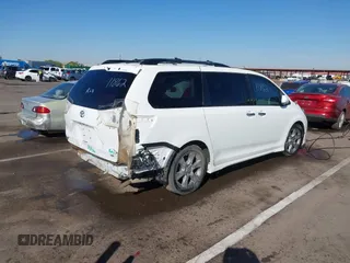 2014 Toyota Sienna SE with VIN 5TDXK3DCXES427950, listed as a IAAI auction lot 40394109 with 149,419 mi miles. Bid and sale history available at carsss.com. Image 4.