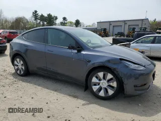 2023 Tesla Model Y Long Range with VIN 7SAYGDEE7PA031199, listed as a Copart auction lot 53876105 with 10,835 mi miles and Salvage Title. Bid and sale history available at DreamBid. Image 4.