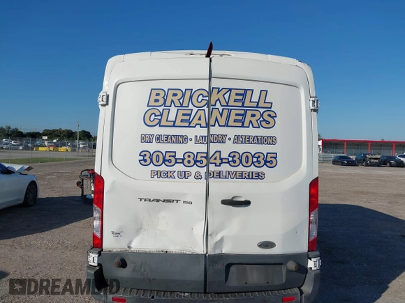 2015 Ford Transit Cargo with VIN 1FTNE2CM9FKA64133, listed as a IAAI auction lot 41312926 with 117,176 mi miles and . Bid and sale history available at carsss.com. Image 16.