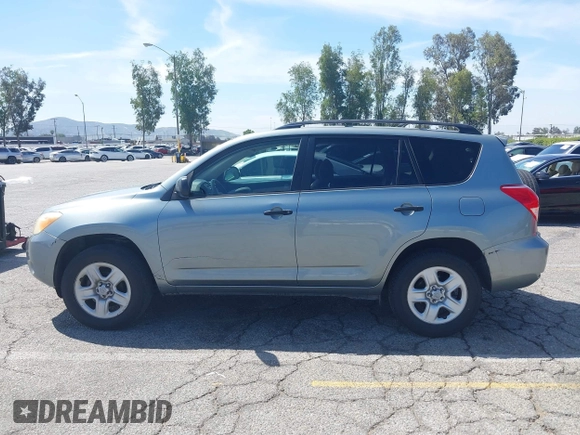 2008 Toyota RAV4 with VIN JTMZD33V085104930, listed as a IAAI auction lot 42068409 with 187,574 mi miles. Bid and sale history available at carsss.com. Image 14.