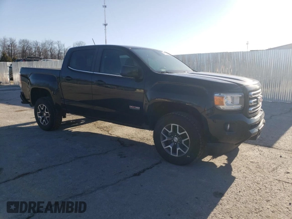 2020 GMC Canyon 4WD All Terrain w/Cloth with VIN 1GTG6FENXL1153908, listed as a Copart auction lot 48123595 with 82,835 mi miles and Salvage Title. Bid and sale history available at carsss.com. Image 4.