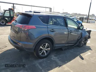 2018 Toyota RAV4 XLE with VIN JTMRFREVXJD251679, listed as a Copart auction lot 49454115 with 48,385 mi miles and Salvage Title. Bid and sale history available at DreamBid. Image 3.