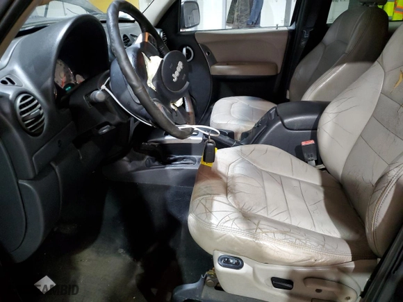 2004 Jeep Liberty Limited with VIN 1J4GL58K84W177787, listed as a Copart auction lot 88910535 with 143,779 mi miles and Salvage Title. Bid and sale history available at carsss.com. Image 7.