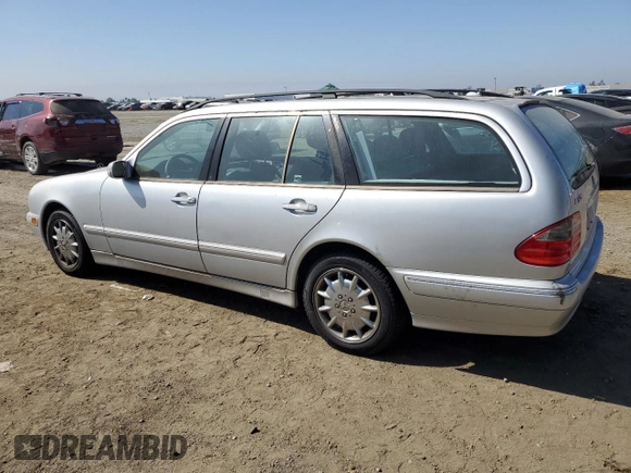 2001 Mercedes-Benz E-Class with VIN WDBJH65J01B276815, listed as a Copart auction lot 75748694 with 208,827 mi miles and Clean Title. Bid and sale history available at carsss.com. Image 2.