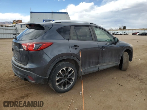2016 Mazda CX-5 Grand Touring z VIN JM3KE4DY0G0633861, wystawiony jako Copart lot #47748645 z przebiegiem 112 219 mil mil oraz Szkoda całkowita • Salvage title. Historia ofert i sprzedaży dostępna na DreamBid. Obrazek 3.