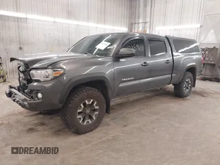 2016 Toyota Tacoma SR5 with VIN 3TMDZ5BN0GM012248, listed as a IAAI auction lot 41215908 with 170,756 mi miles and . Bid and sale history available at DreamBid. Image 18.