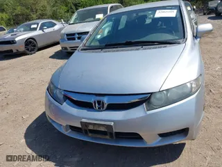 2009 Honda Civic Sdn LX with VIN 2HGFA16529H319443, listed as a IAAI auction lot 42065285 with 92,900 mi miles. Bid and sale history available at carsss.com. Image 6.