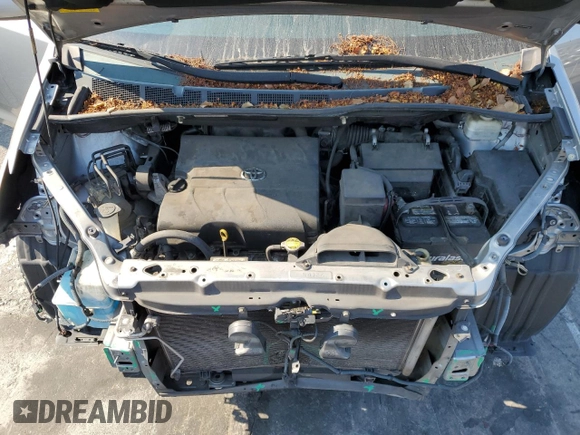 2011 Toyota Sienna LE AAS with VIN 5TDKK3DC6BS054847, listed as a Copart auction lot 64673975 with 197,266 mi miles and Salvage title. Bid and sale history available at DreamBid. Image 12.